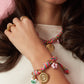 Touw armband met knopen en schelp charms