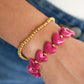 Elastieken hartjes kralenarmband